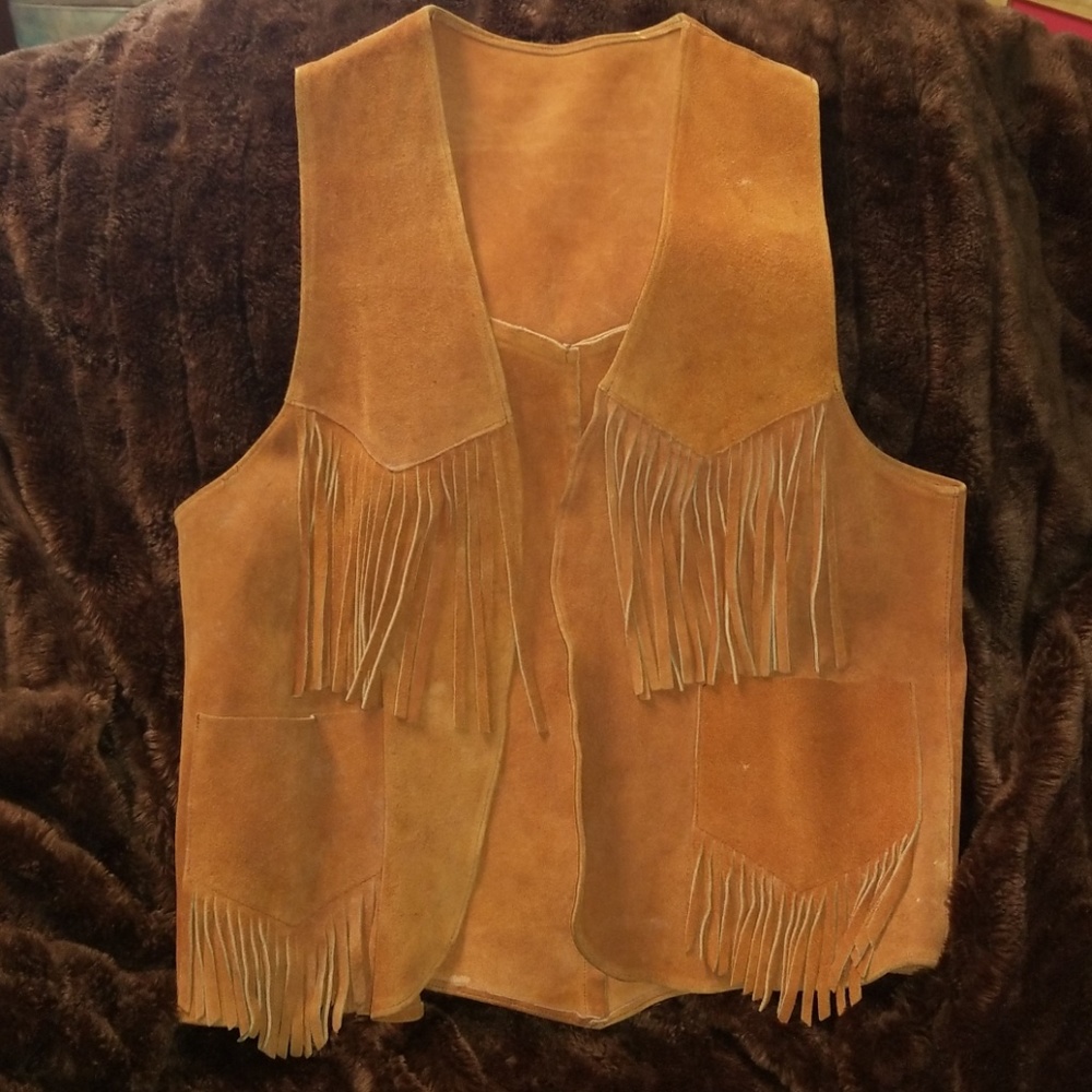 Womens suade like soft leather fringed vest.